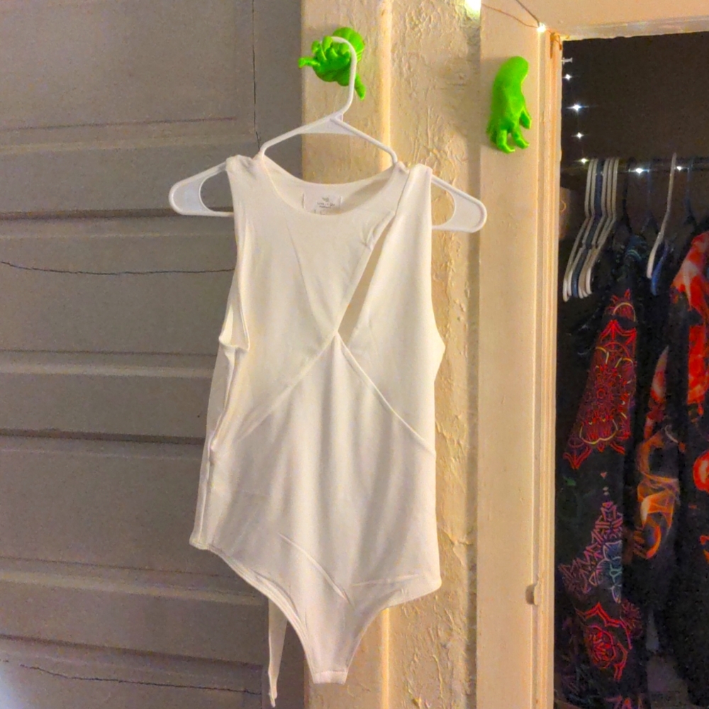 Cutout Asymmetrical Partially Lined Thong Style Bodysuit